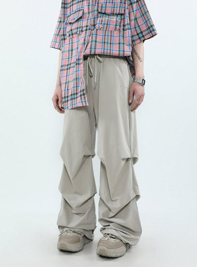 Mr Nearly Text Embroidery Pleated Wide Leg Pants Korean Street Fashion Pants By Mr Nearly Shop Online at OH Vault
